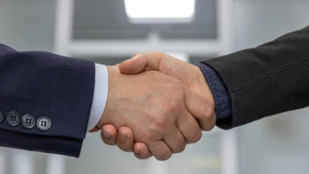 Close-up of a business handshake representing a successful partnership or agreement